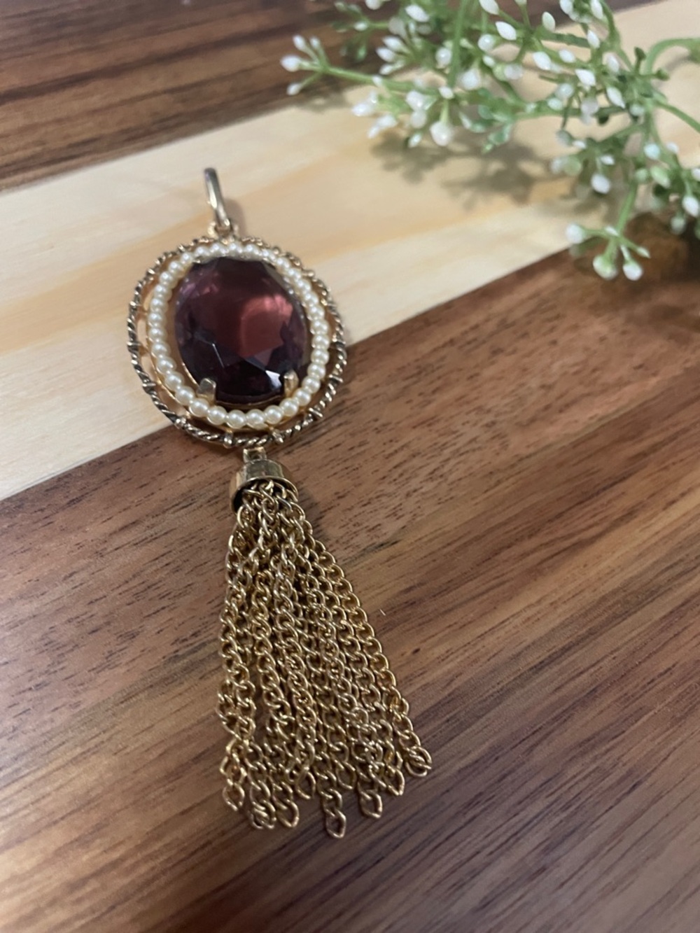 Gold Tassel Necklace with Garnet-Colored Crystal and Pearl Halo